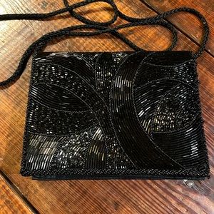 Black sequined evening clutch